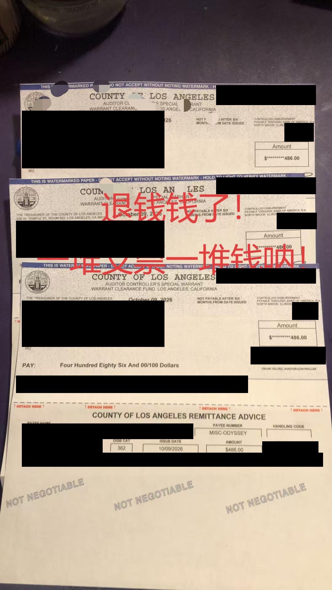 Three camera tickets; LA County issued three $486 refund checks (Oct 9, 2026).